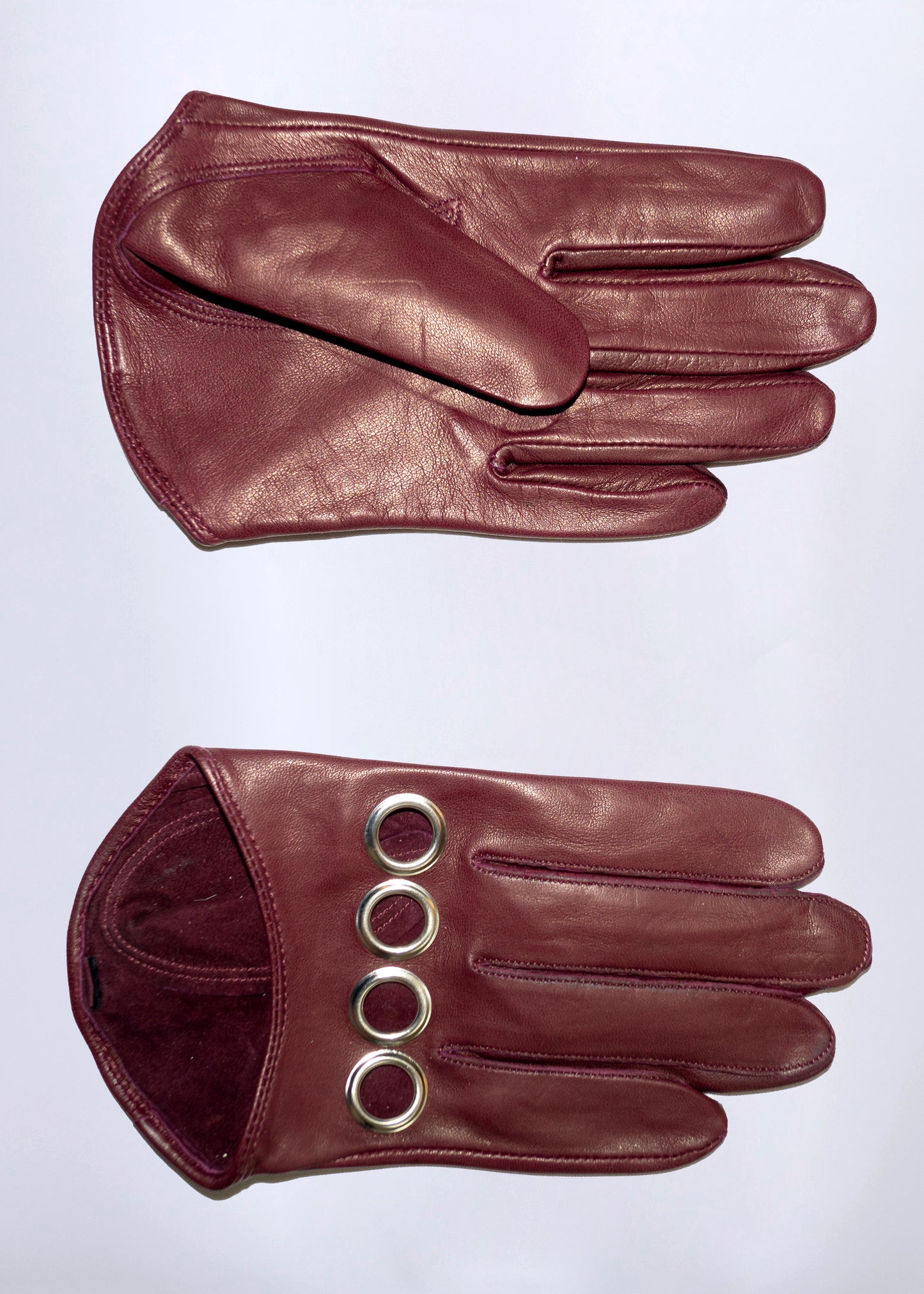 Punch leather gloves