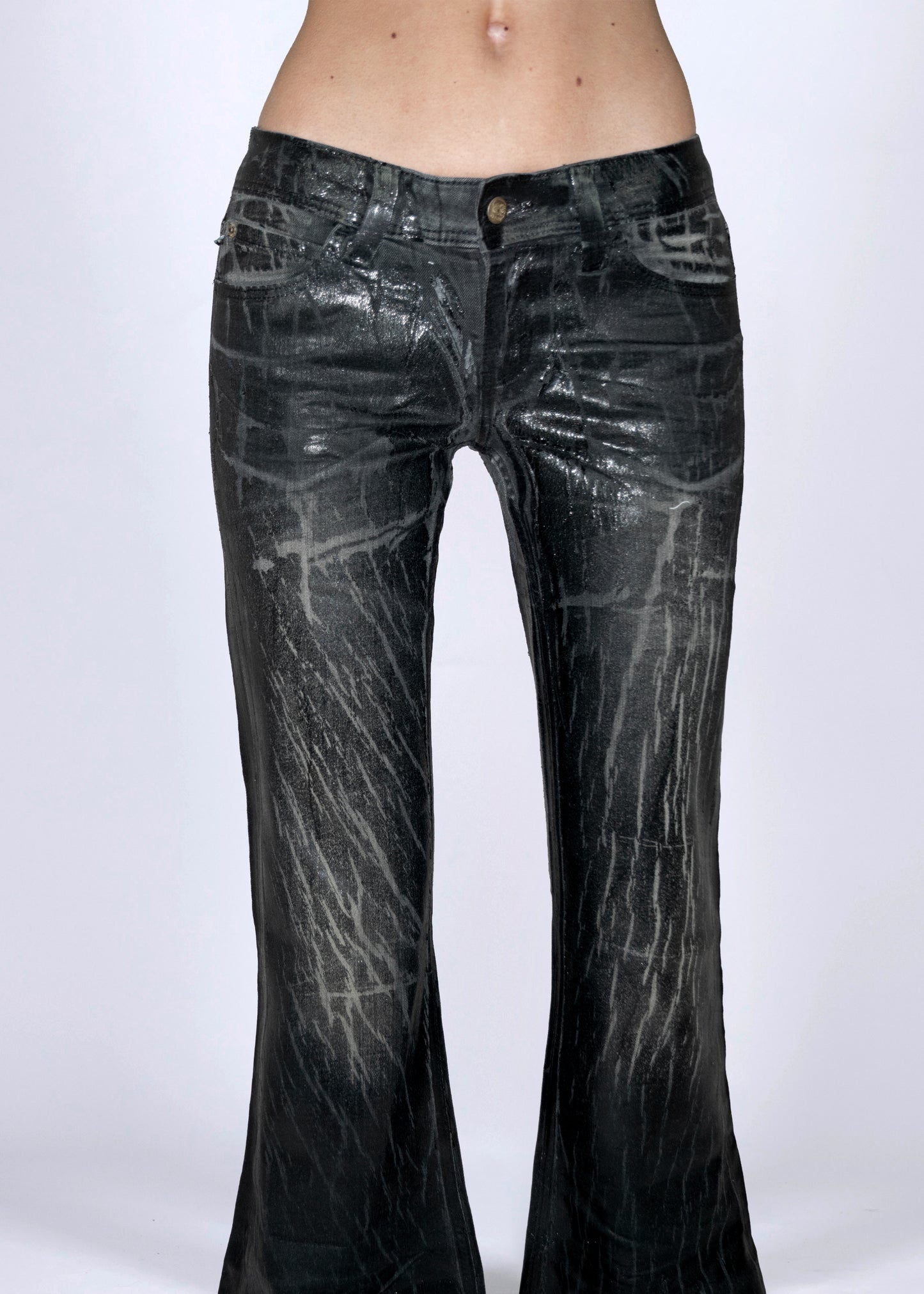 Cracked leather effect jeans