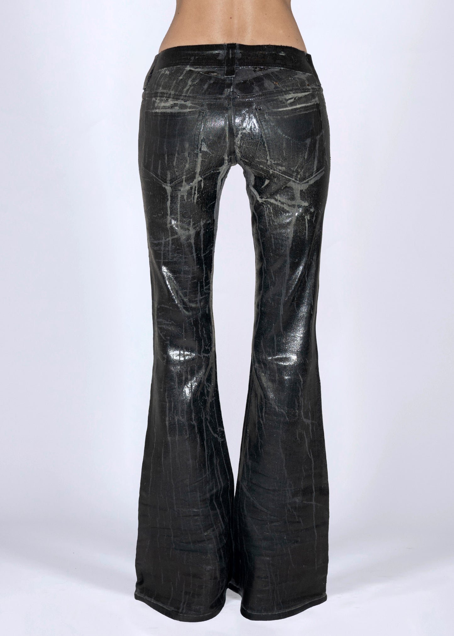 Cracked leather effect jeans